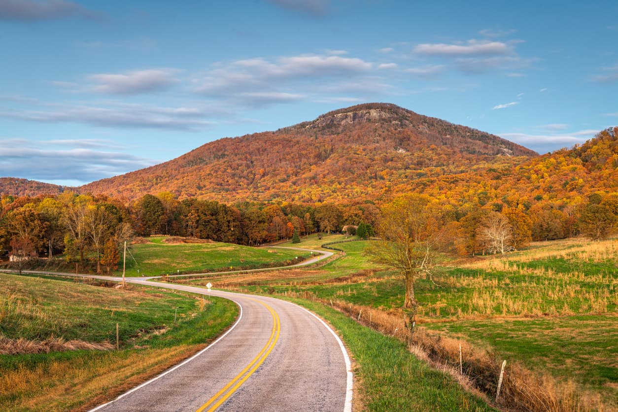 Mt. Yonah rising over a North Georgia road in fall
